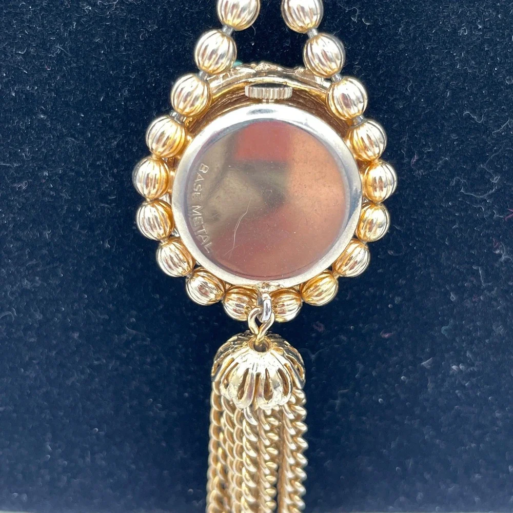 Unbranded Goldtone Metal Womens OS Vintage Peek A Boo Tassel Watch Necklace 24